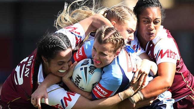 NSW Samantha Bremner is tackled during the NSW v QLD Interstate Challenge at WIN Stadium, Wollongong. Pic: Brett Costello