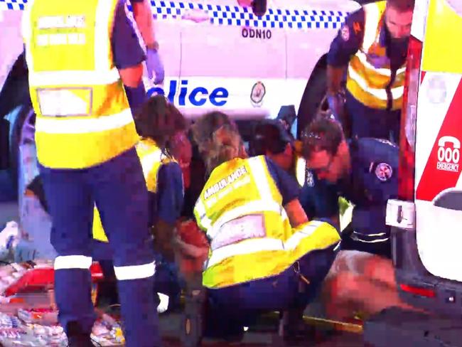 The police officers were rushed to hospital. Picture: OnScene Bondi