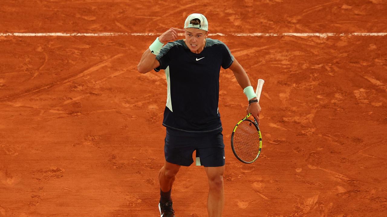 PARIS, FRANCE - JUNE 01: Holger Rune of Denmark reacts against Casper Ruud of Norway during the Men's Singles Quarter Final match on Day 11 at Roland Garros on June 01, 2022 in Paris, France. (Photo by Adam Pretty/Getty Images)