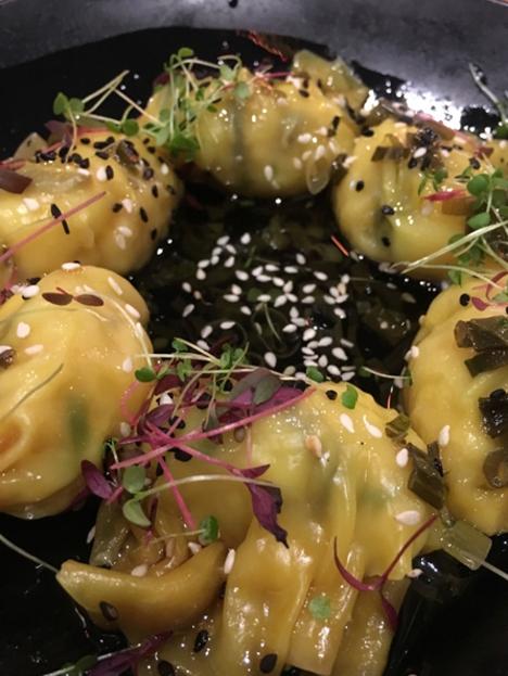 Prawn, wood ear mushroom, sesame and bamboo dumplings in a spring onion dressing from Oriental Teahouse. Photo: Supplied