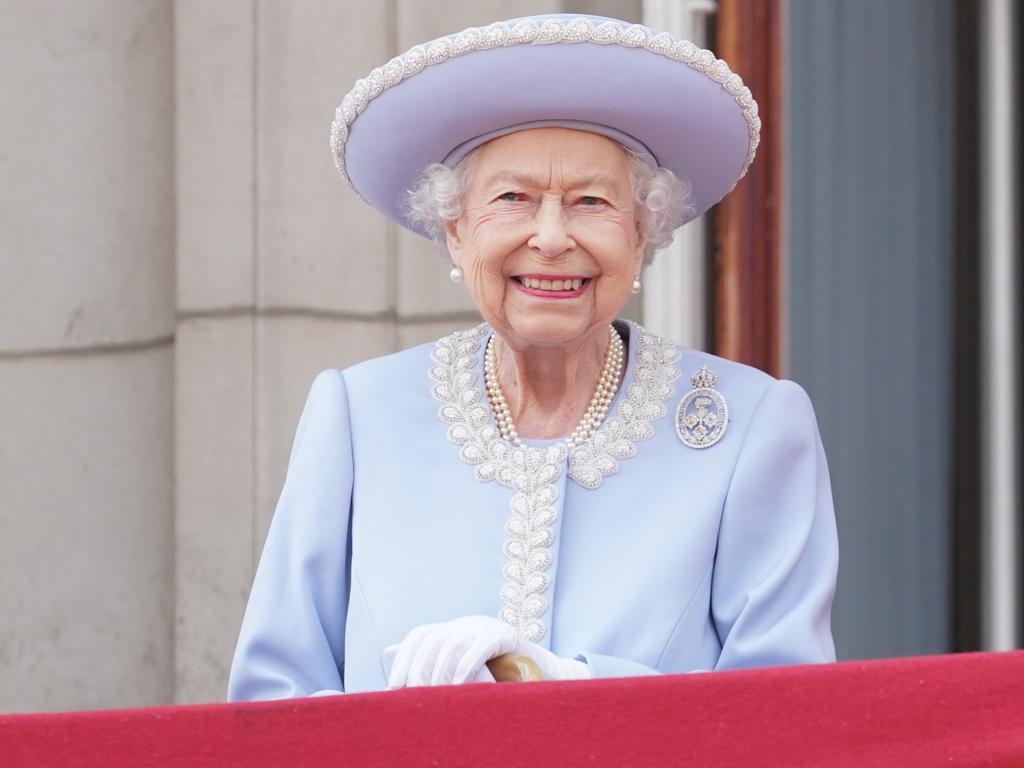 The Queen was all smiles as crowds gathered outside Buckingham Palace. Picture: Getty Images