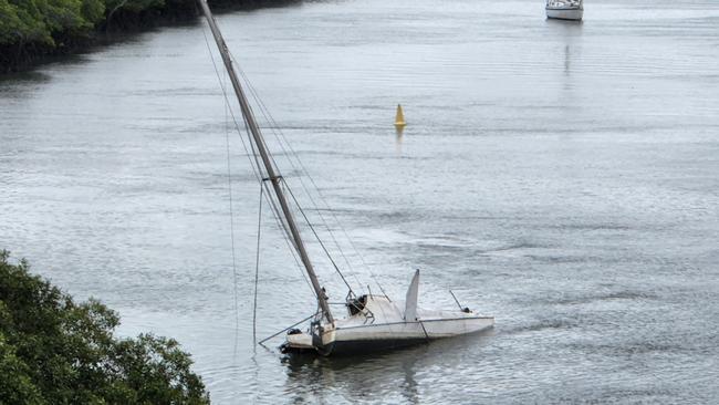 Half of the sunken vessel was under water in the Calliope River at Gladstone on Tuesday, July 4, 2023. Photo: Darryn Nufer.