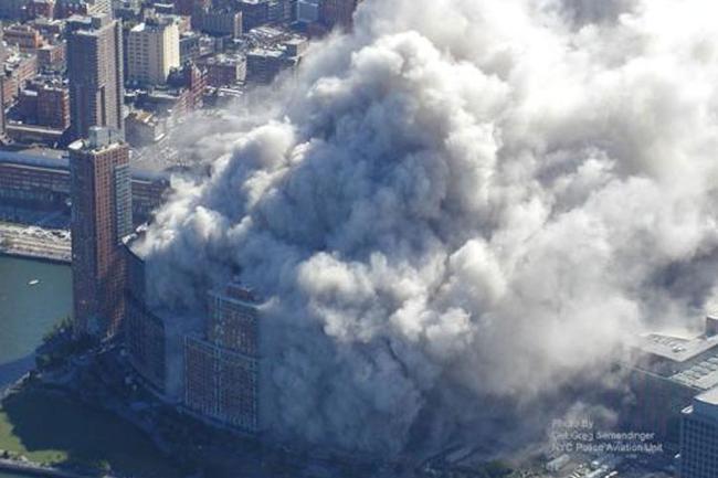 The dust and debris is about to invade New York after the attack. ABC News in the US recently obtained these images through Freedom of Information Act request in 2009 with the National Institute of Standards and Technology. Picture: Det. Greg Semendinger/NYC Police Aviation Unit.