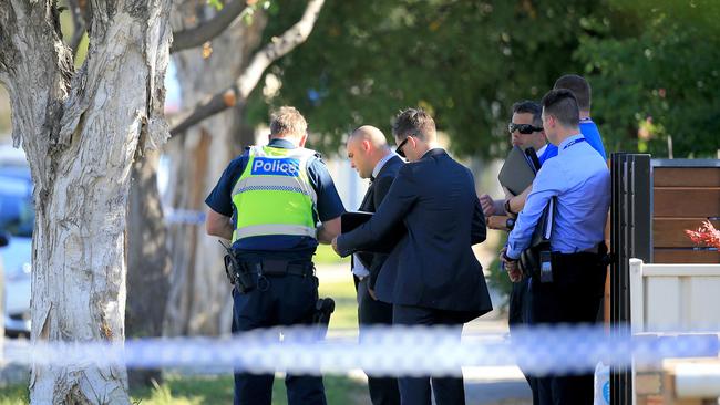 Detectives at the scene where a child has been found in a car. Picture: Mark Stewart