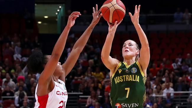 Tess Madgen (C) of Australia shoots during the 2022 FIBA Women's Basketball World Cup Group B match between Australia and Canada at Sydney Superdome. (Photo by Kelly Defina/Getty Images)