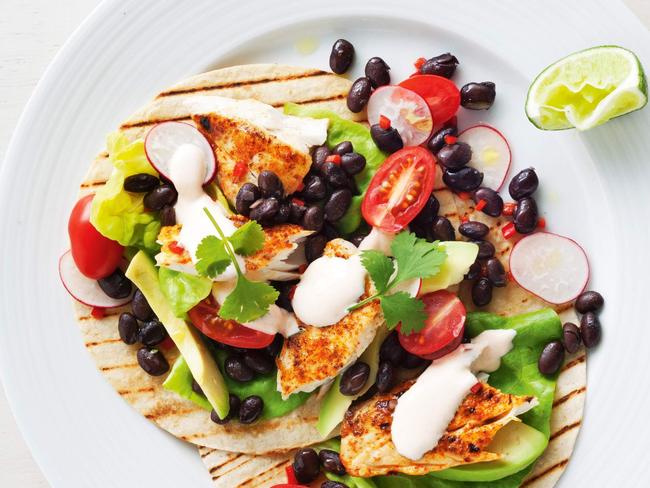 Fish fajitas with black bean and avocado salsa.