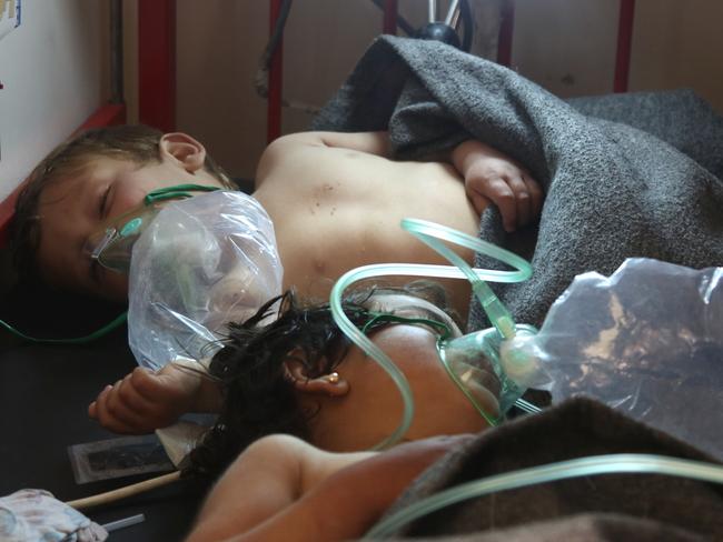 Syrian children receive treatment after the gas attack, which killed more than 70 people. Picture: AFP Photo