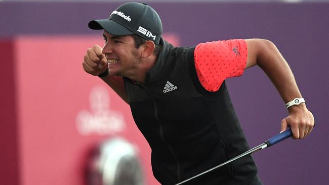 Lucas Herbert celebrates after winning the Dubai Desert Classic.