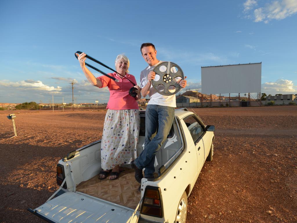 Locals at the Coober Pedy drive-in theatre - the last remaining drive-in in South Australia, following the fire at Gepps Cross overnight. Picture: Sam Wundke.