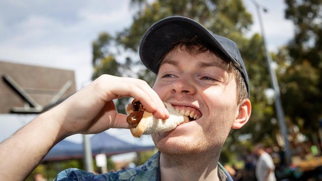 Democracy sausage, don’t mind if I do. Picture: Mark Stewart