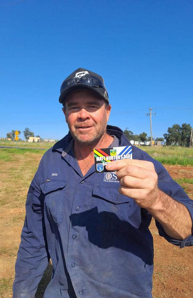 Guy Burton with his business card which references his son Matt, the former Penrith player and current Canterbury star.