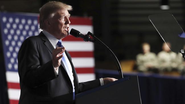 President Donald Trump speaks at Fort Myer in Arlington Virginia during a Presidential Address to the Nation about a strategy he believes will best position the US to eventually declare victory in Afghanistan.