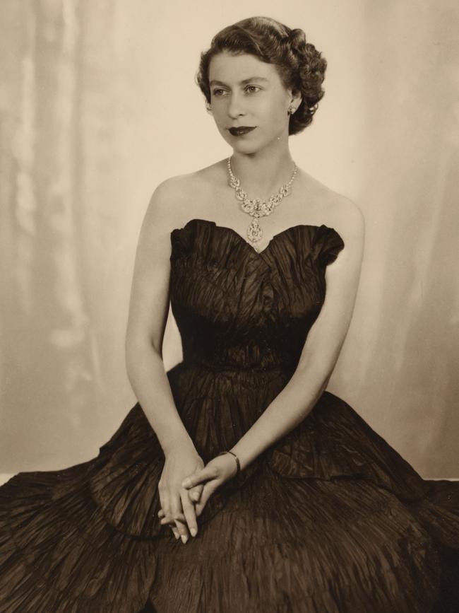 Queen Elizabeth II in photograph by photographer Dorothy Wilding, 1952 and hand-tinted by Beatrice Johnson, at National Portrait Gallery in London. Picture: Supplied
