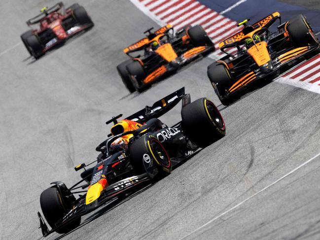 Red Bull Racing’s Max Verstappen leads McLaren duo Lando Norris and Oscar Piastri in the Austria GP sprint race. Picture: AFP
