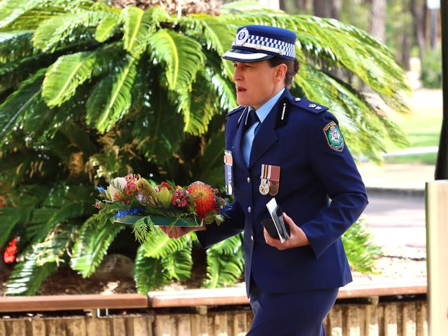 Mourners at the memorial service with full police honours for constables Rachel McCrow and Matthew Arnold at Brisbane Entertainment Centre. Picture: David Clark