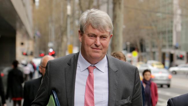 Nicholas Sampson, former headmaster of Geelong Grammar and Cranbrook in Sydney, leaves the County Court in Melbourne during the child abuse Royal Commission hearing.