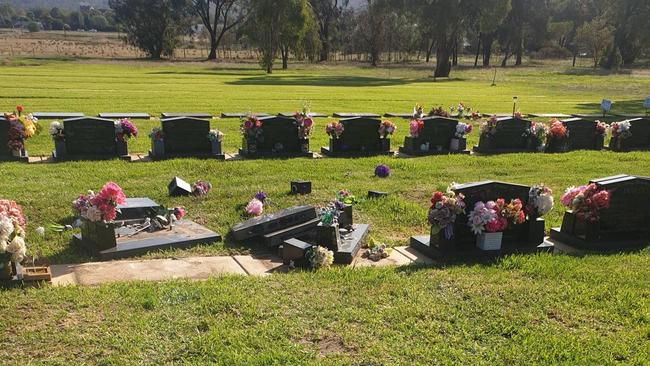 Police are appealing for information after someone drove into gravesites at Cootamundra General Cemetery.