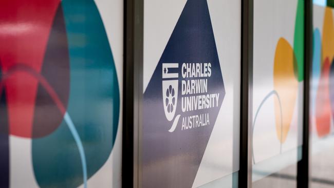 Charles Darwin University signage at the Darwin Waterfront. Picture: Che Chorley