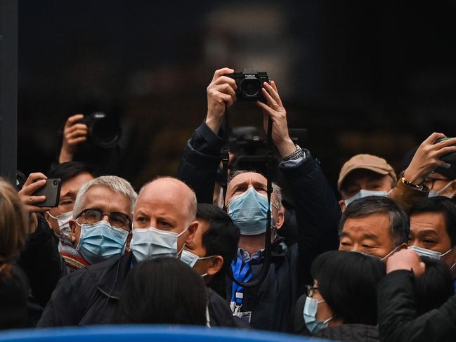 Members of the World Health Organisation (WHO) team, investigating the origins of the Covid-19 coronavirus, visit the closed Huanan Seafood wholesale market in Wuhan. Picture: AFP