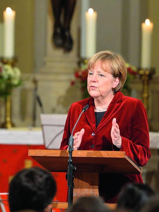 Merkel speaking at Mary Madgalene Church in Templin, Germany, in 2014. Picture: Bernd Settnik/Picture Alliance via Getty Images