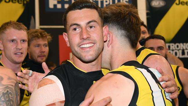 Jack Graham gets a hug from Jayden Short after last year’s preliminary final win.