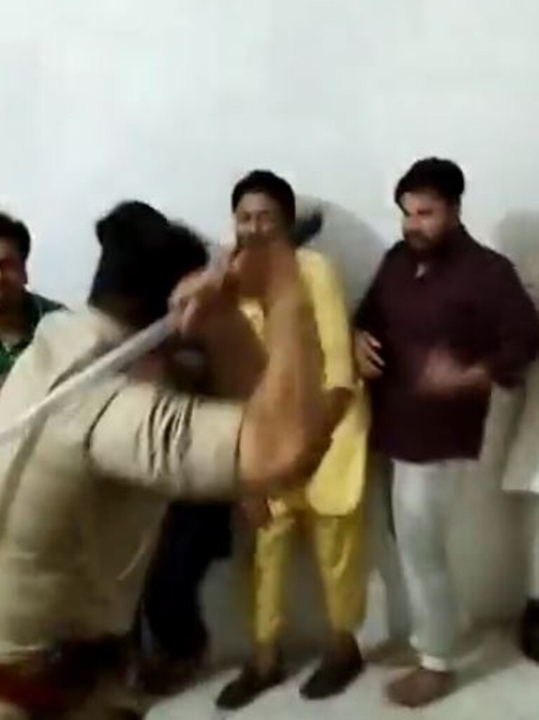 Indian police beat Muslim detainees. Picture: Twitter