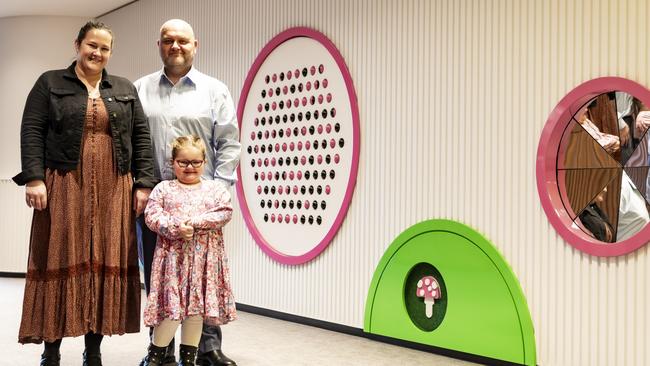 Hannah Dyer, 5, at Next Sense with her parents Tammy and Peter. Picture: Grant Leslie Photography