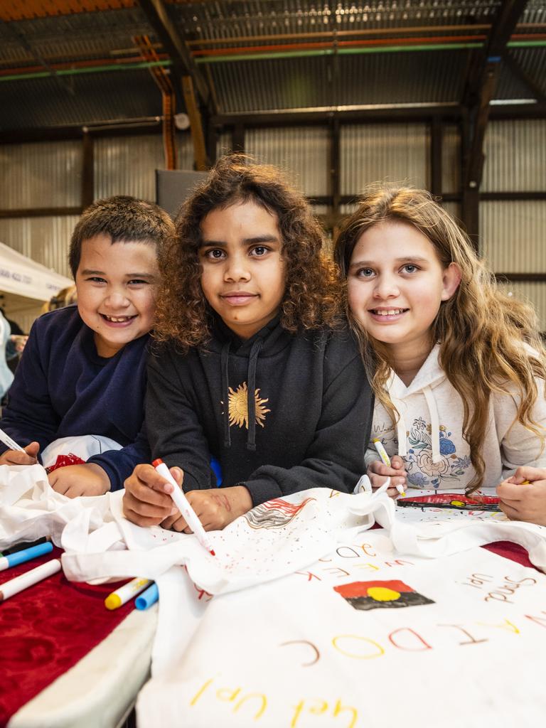 Drawing are (from left) Tysean, Jahkota and Azariah Landsborough at the Toowoomba NAIDOC Week celebrations at The Goods Shed, Monday, July 4, 2022. Picture: Kevin Farmer