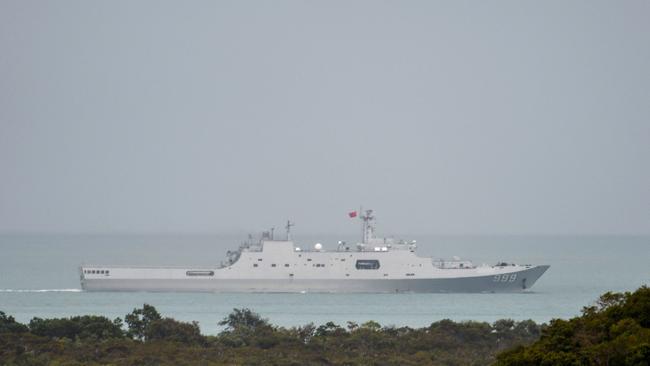 A Chinese PLA-N Yuzhao-class amphibious transport dock vessel sails through the Torres Strait.