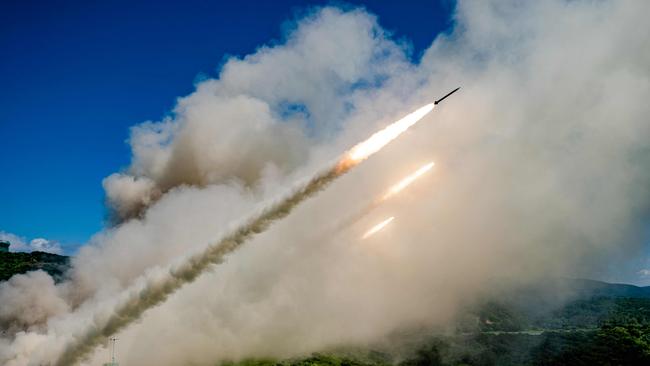 A projectile being launched from a Taiwanese-made Thunderbolt-2000 Multiple Rocket System during exercises in Pingtung country. Picture: Taiwan Defence Ministry/AFP