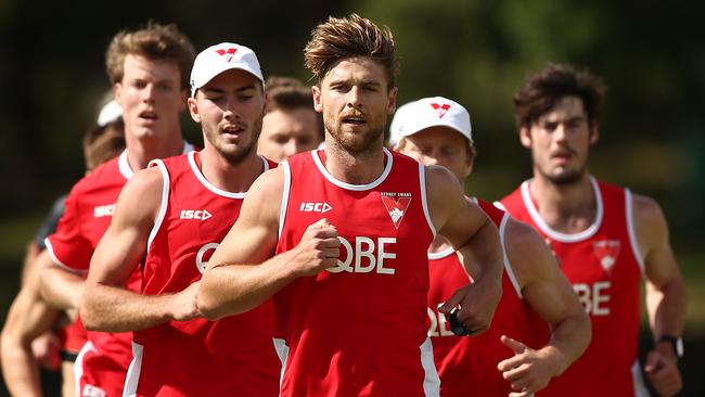 Dane Rampe leads the pack at Swans’ training.