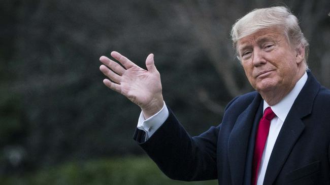 U.S. President Donald Trump and First Lady Melania Trump walk along the South Lawn to Marine One as they depart from the White House for a weekend trip to Mar-a-Lago on January 31, 2020 in Washington. Picture: Getty Images