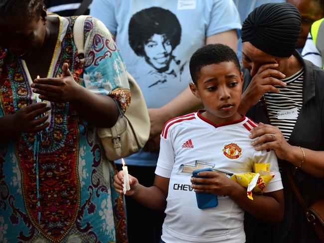 Emotions run high at a candlelit vigil outside Notting Hill Methodist Church near Grenfell Tower. Picture: Chris J Ratcliffe/Getty Images