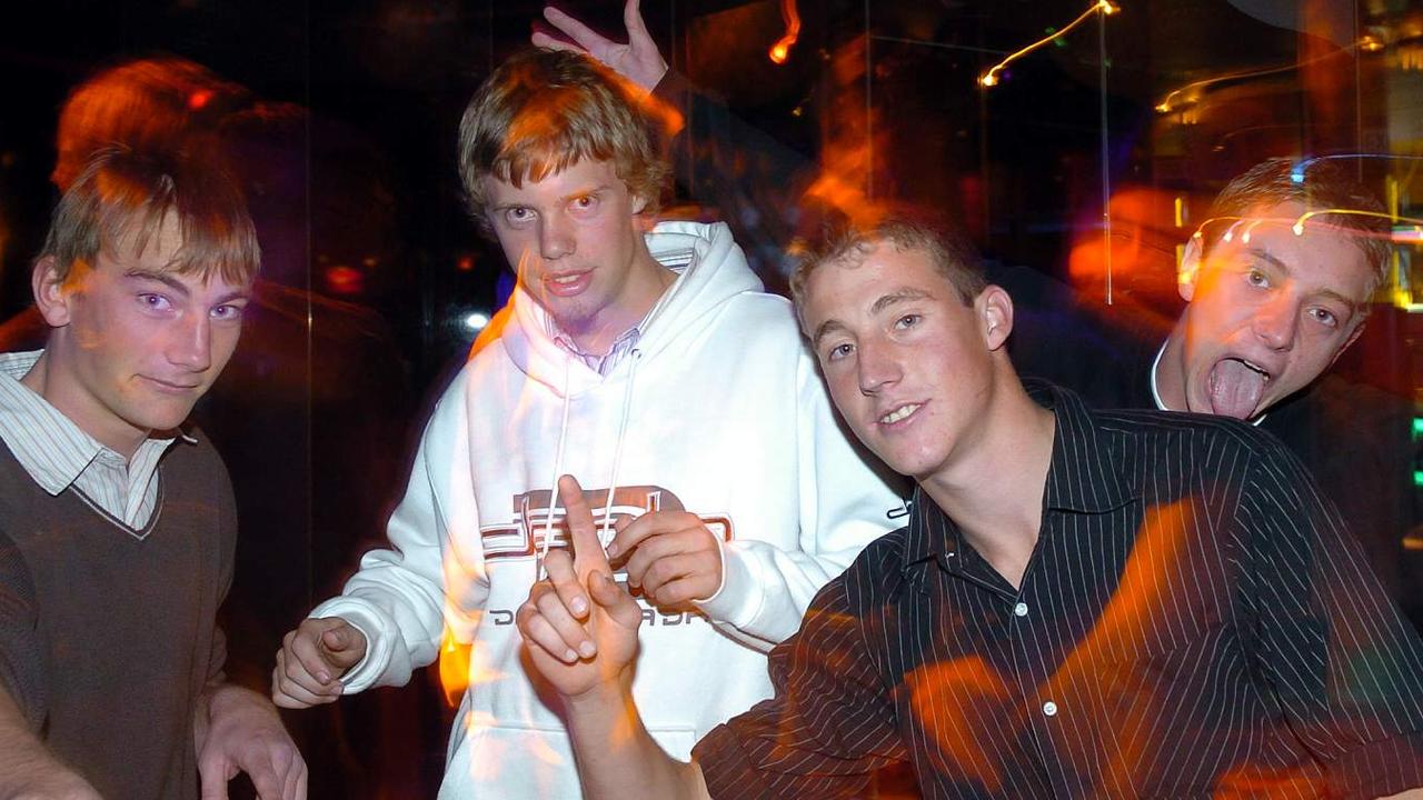 Dane Seicker, Brendan Oldman, Jack Johnson and Sid Stout party at the Rolling Rock nightclub in July 2004. Picture: Geoff Potter