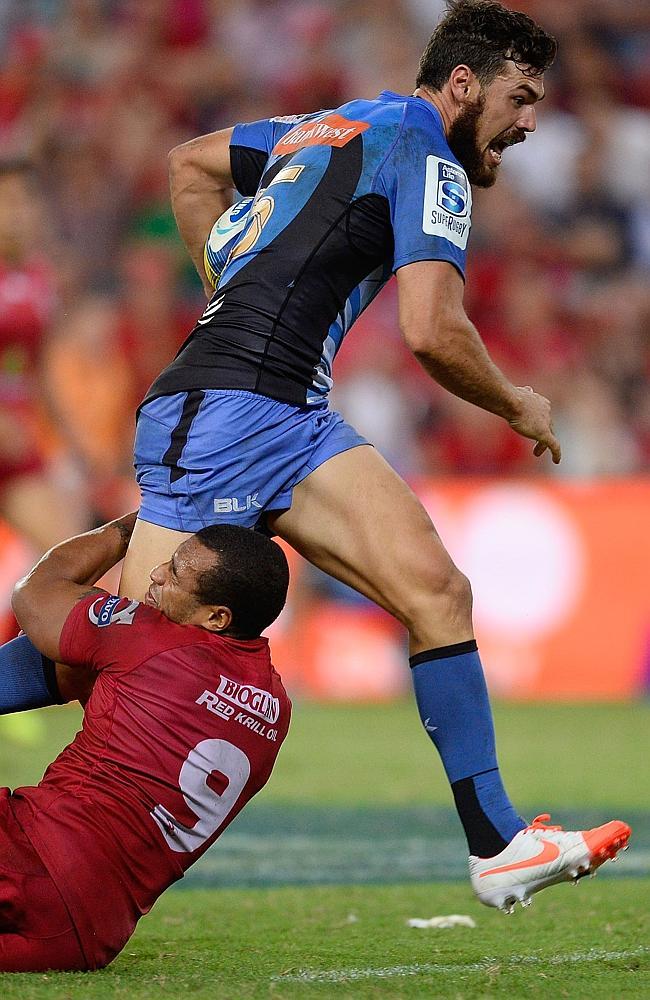 Jayden Hayward skips out of a Will Genia tackle on his way to score the winning the try for Force.