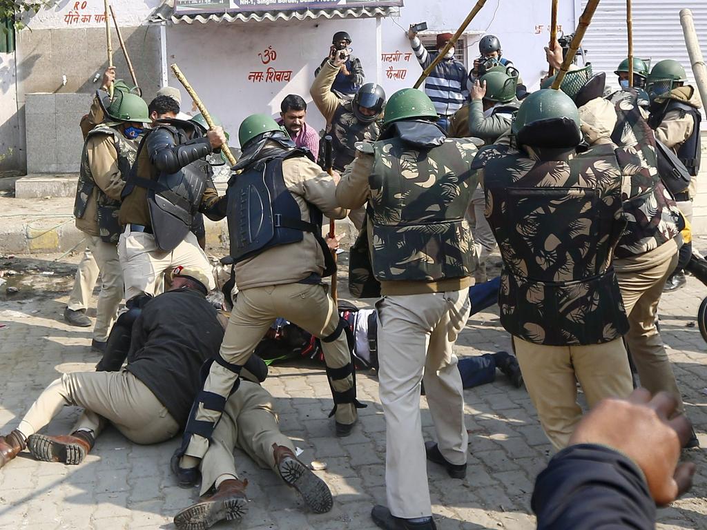 Police beating a farmer at a protest in January. Picture: Arun Kumar/AFP