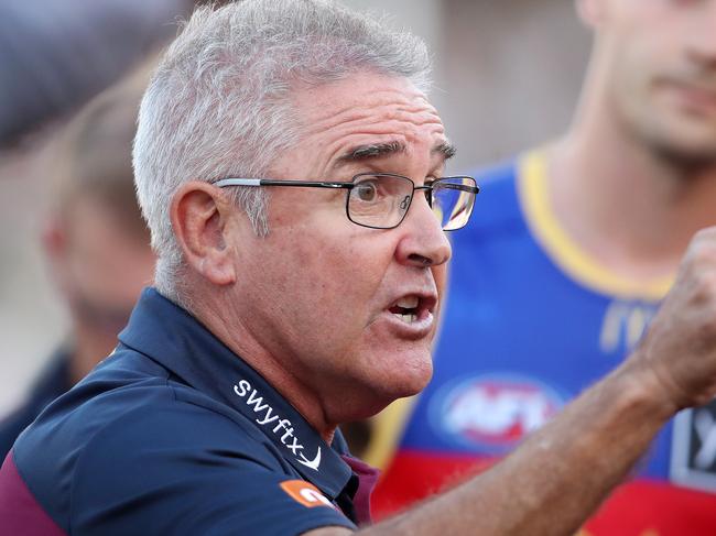 ADELAIDE, AUSTRALIA - MARCH 18: Chris Fagan, Senior Coach of the Lions with his players at 3 quarter time during the 2023 AFL Round 01 match between the Port Adelaide Power and the Brisbane Lions at Adelaide Oval on March 18, 2023 in Adelaide, Australia. (Photo by Sarah Reed/AFL Photos via Getty Images)