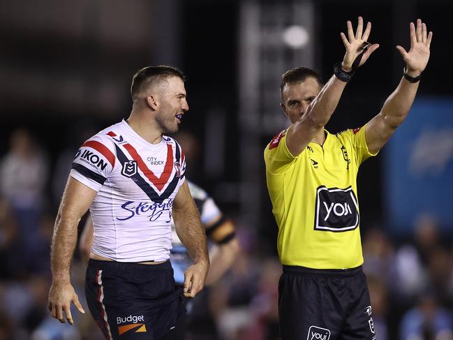 James Tedesco talks to referee Grant Atkins as he sends Brandon Smith (not shown) to the bin. Picture: Getty Images