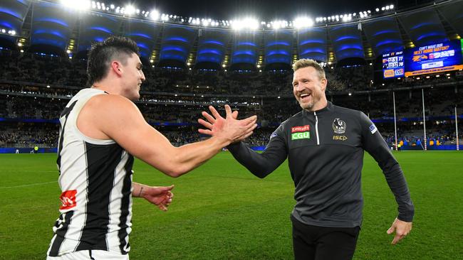 PERTH, AUSTRALIA - JULY 12: Nathan Buckley, Senior Coach of the Magpies celebrates the win with Brayden Maynard during the 2019 AFL round 17 match between the West Coast Eagles and the Collingwood Magpies at Optus Stadium on July 12, 2019 in Perth, Australia. (Photo by Daniel Carson/AFL Photos via Getty Images)