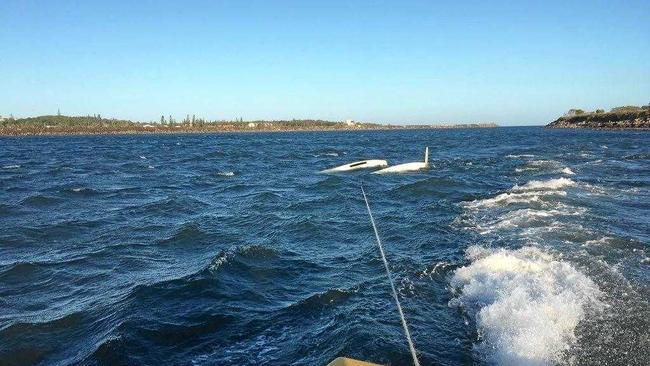 A man and woman were rescued from a catamaran which flipped on the Richmond River at Ballina on Saturday night. Picture: Surf Life Saving NSW