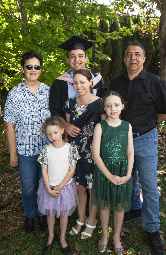 Master of Education (Guidance and Counselling) graduate Leland Palmer celebrates with (from left) Carlette, Lucy, Leesa, Lola and Kurt Palmer at a UniSQ graduation ceremony at The Empire, Tuesday, October 29, 2024. Picture: Kevin Farmer