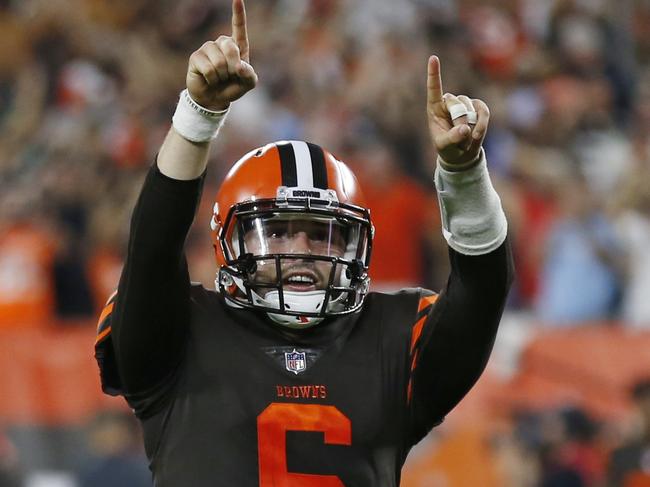 Cleveland Browns quarterback Baker Mayfield celebrates a 1-yard touchdown by running back Carlos Hyde during the second half of an NFL football game against the New York Jets, Thursday, Sept. 20, 2018, in Cleveland. (AP Photo/Ron Schwane)