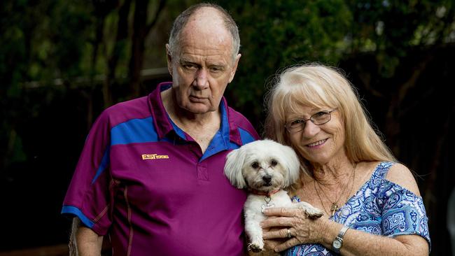 John Derry with his wife Heather Derry and their new dog Winter which they recently adopted. Picture: Jerad Williams.