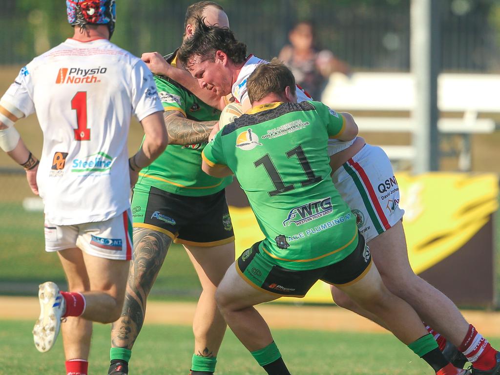 Nightcliff’s Zachery Mott surges through a tackle in the NRL NT A-Grade match between Nightcliff Dragons and Palmerston Raiders. Picture: Glenn Campbell