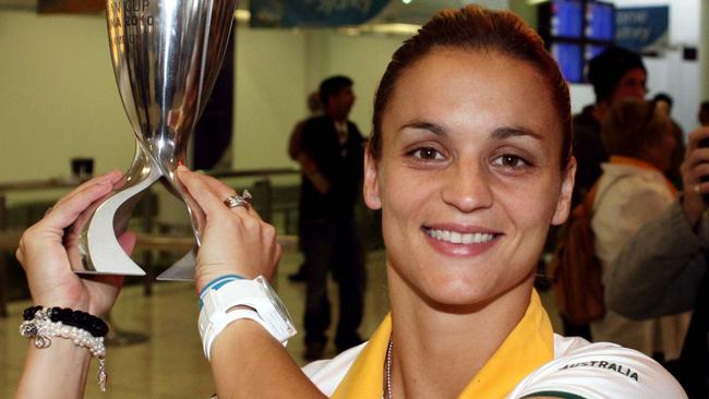 Former Matildas captain Melissa Barbieri with the AFC Asian Cup trophy at Sydney Airport in 2010.