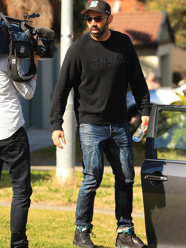 Sydney Swans star player Adam Goodes leaving his North Bondi home today after taking a few days off training.