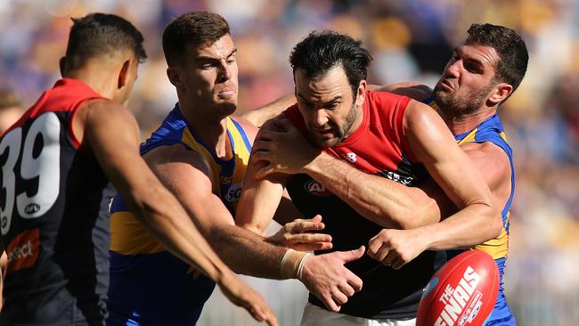 Jordan Lewis tries to burst through a tackle during last year’s preliminary final loss. Picture: Paul Kane/Getty Images.