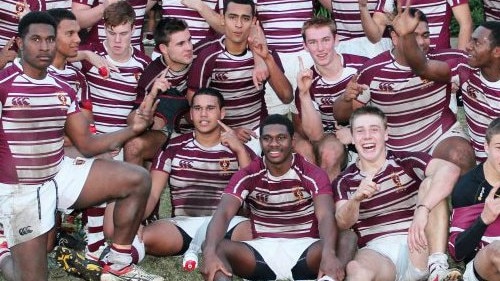 Sorovi (seated front row middle, hands on legs) celebrates with his St Peters Lutheran College teammates after completing an undefeated season in 2012. Picture Supplied