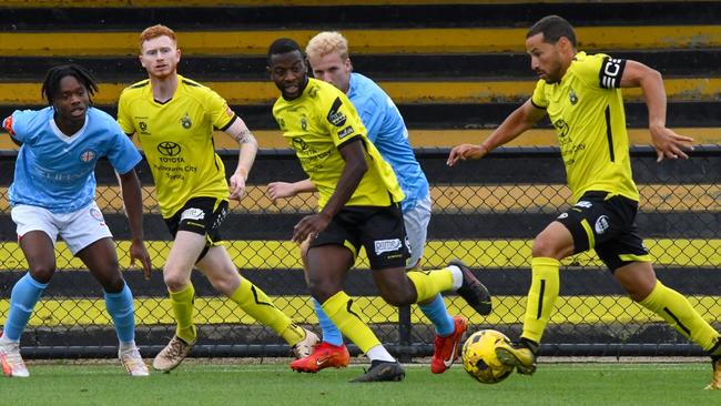 Heidelberg players on the attack. Picture: Sally Tsalikidis