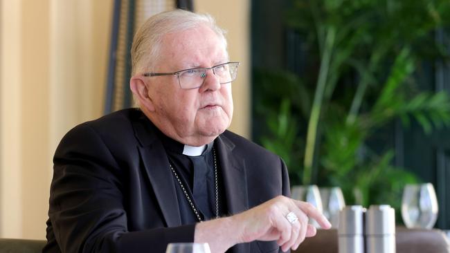 Catholic Archbishop Mark Coleridge being interviewed by Michael Madigan at Moo Moo Bar & Grill, Brisbane City. Picture: Steve Pohlner